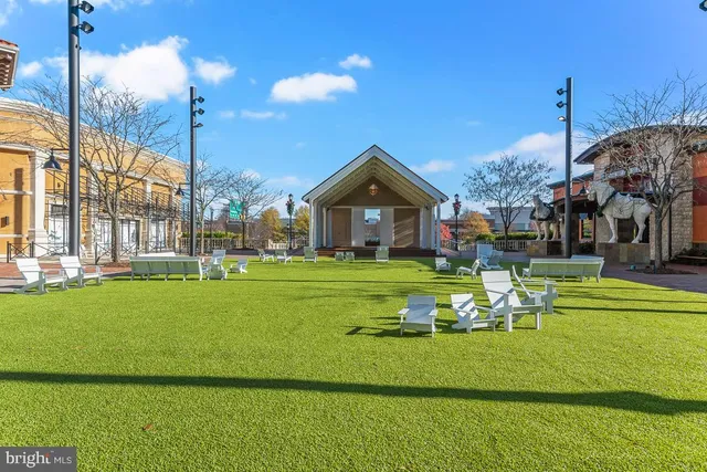 a view of a building with a street