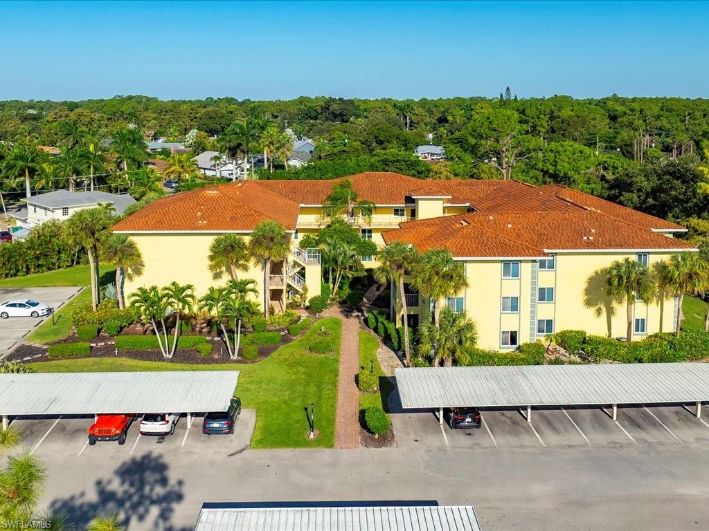 1001 Foxfire Lane, Unit 204 Naples, FL 34104 - Photo 26 of 35 an aerial view of multiple house