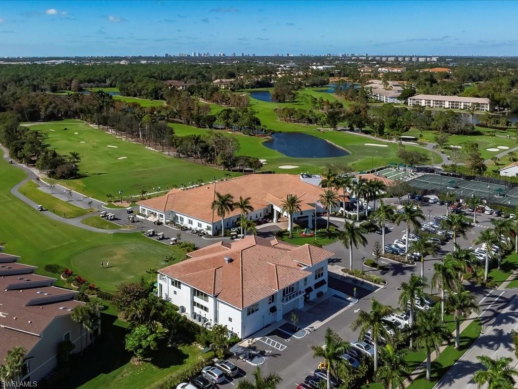 1001 Foxfire Lane, Unit 204 Naples, FL 34104 - Photo 33 of 35 an aerial view of a house with a garden