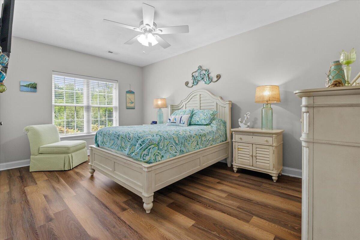 225 Lands End Circle Union Hall, VA 24176 - Photo 46 of 77 a bedroom with a bed wooden floor and a window