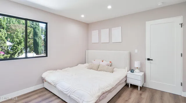 a workspace with furniture and a window