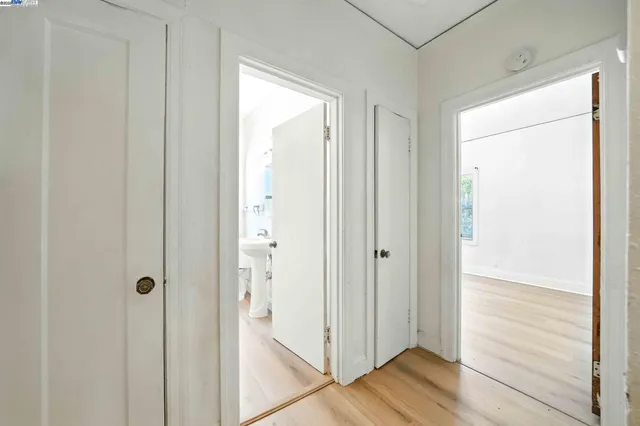 a view of a bathroom with wooden floor