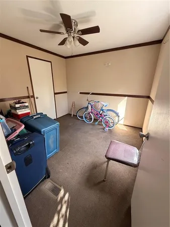 a view of a room with racks on the wall