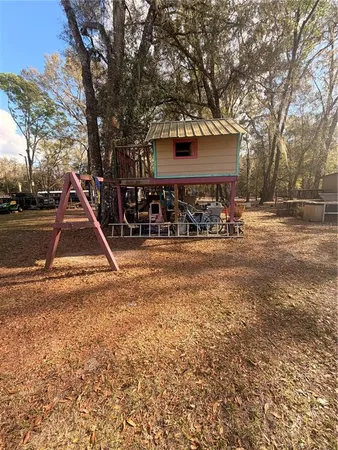 a bathroom with a sink and mirror with toilet