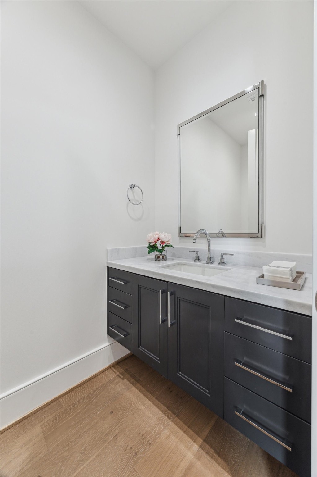5656 San Felipe Street, Unit 1205 Houston, TX 77056 - Photo 29 of 45 a spacious bathroom with a double vanity sink and a mirror