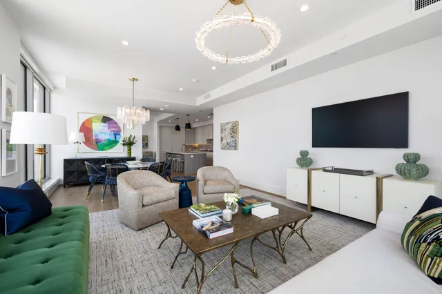a bathroom with a sink toilet and a mirror