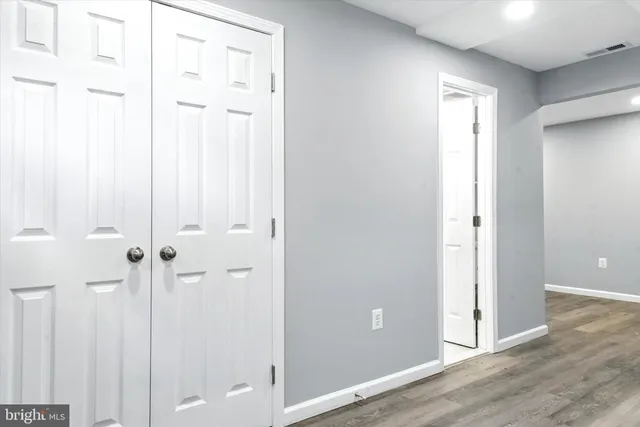 a view of a deck with a large trees