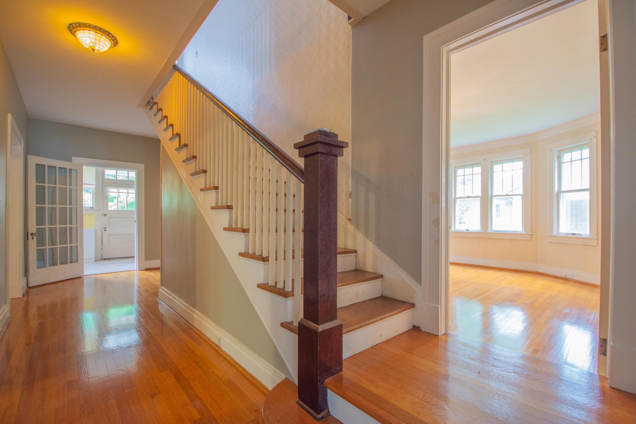 311 South 3rd Street Pulaski, TN 38478 - Photo 23 of 44 a view of an entryway with wooden floor and door