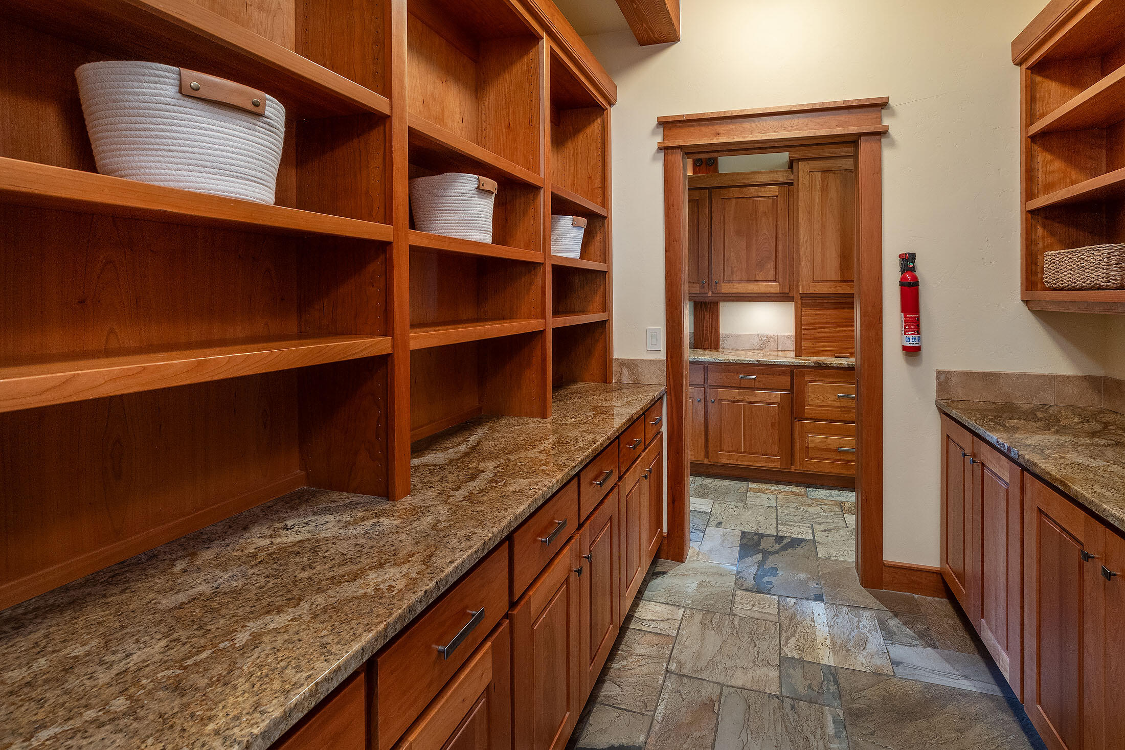 18883 Sutherland Court Bend, OR 97702 - Photo 15 of 70 Elegant utility?extra storage and counter space designed for effortless hosting.