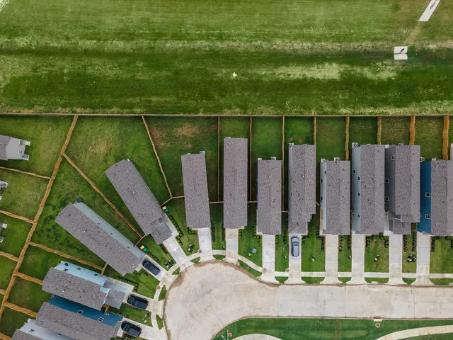 a picture of a bench in front of a window