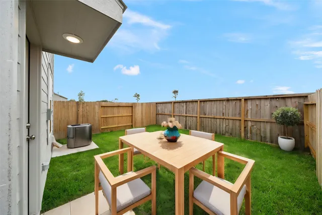 a view of yard from outdoor seating