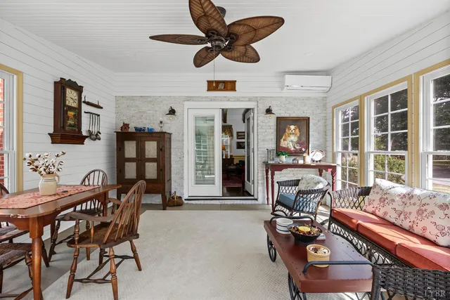 a bathroom with a sink toilet and a mirror