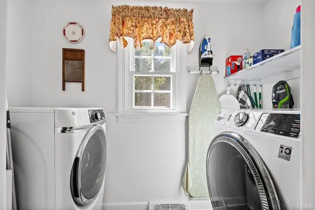 a bed room with a bed and a chair