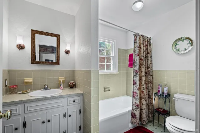 a view of a room with wooden walls