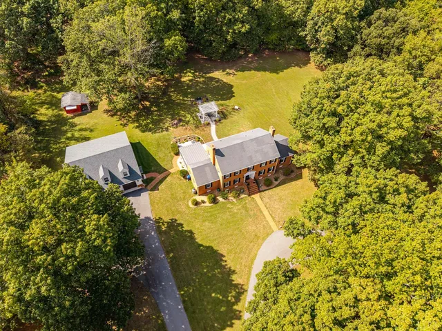 a view of a yard with an outdoor space