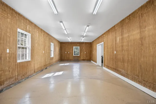 a view of a green field with lots of bushes