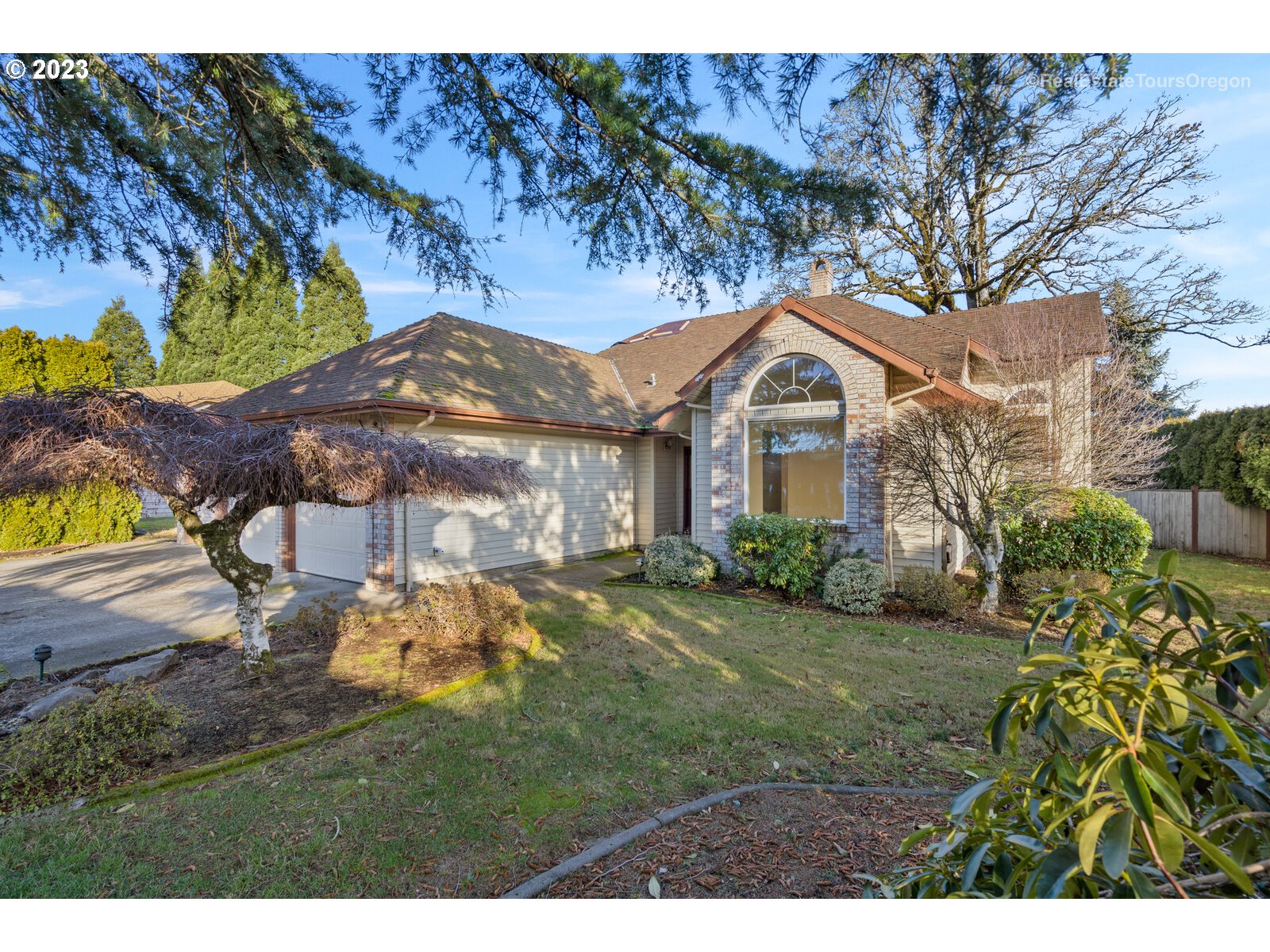 5161 Southeast Powell Valley Road Gresham, OR 97080 - Photo 1 of 32 a front view of a house with a yard