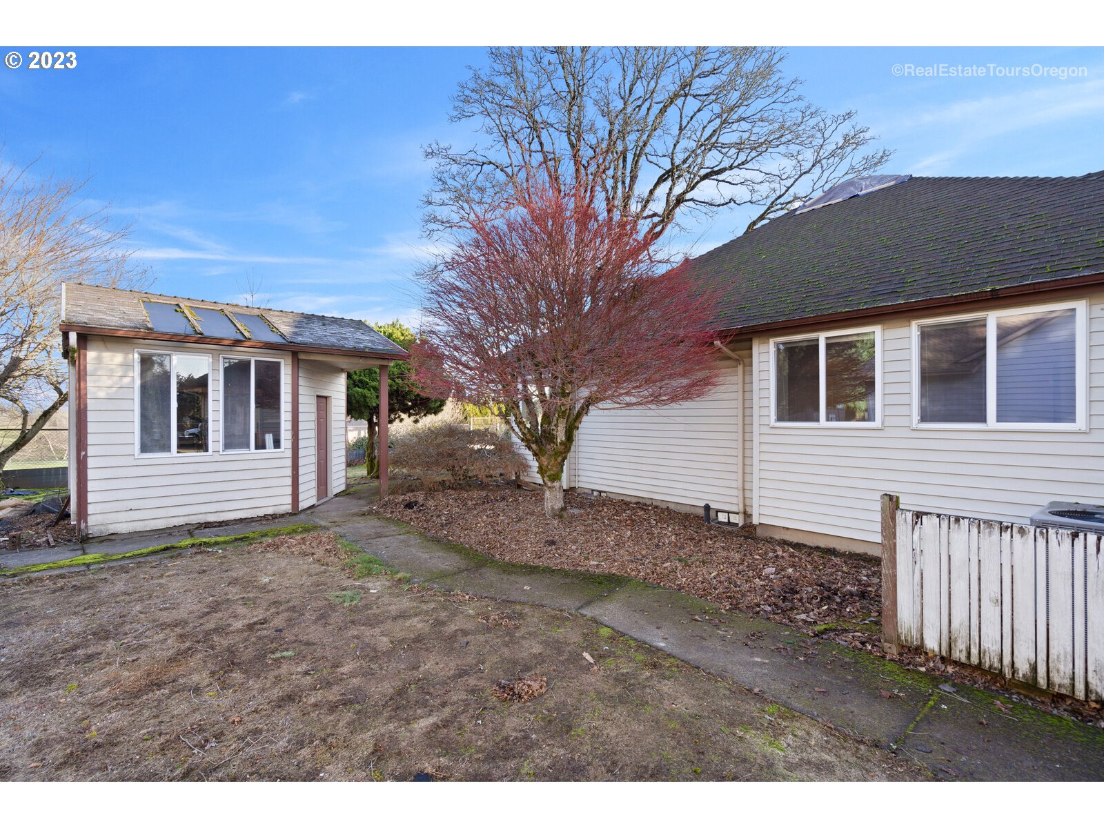 5161 Southeast Powell Valley Road Gresham, OR 97080 - Photo 26 of 32 a view of a house with a yard