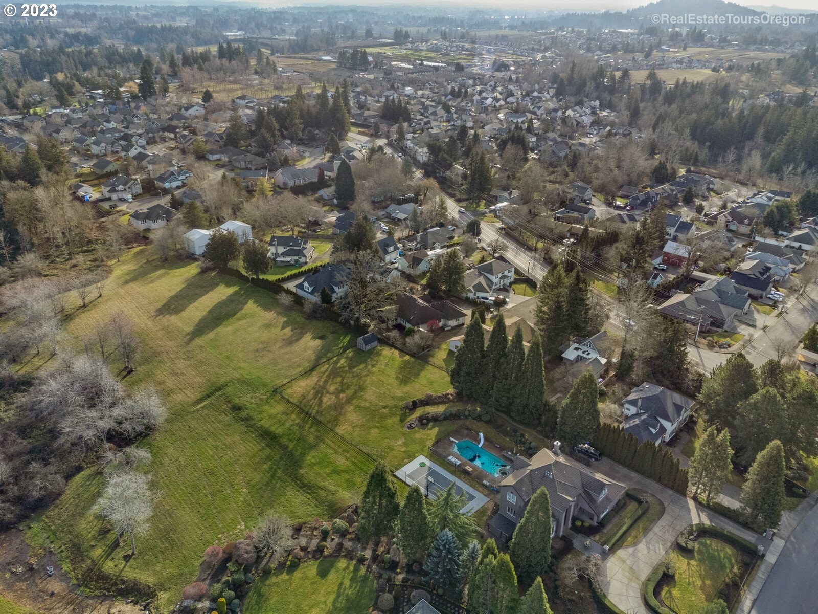 5161 Southeast Powell Valley Road Gresham, OR 97080 - Photo 31 of 32 an aerial view of residential houses with outdoor space