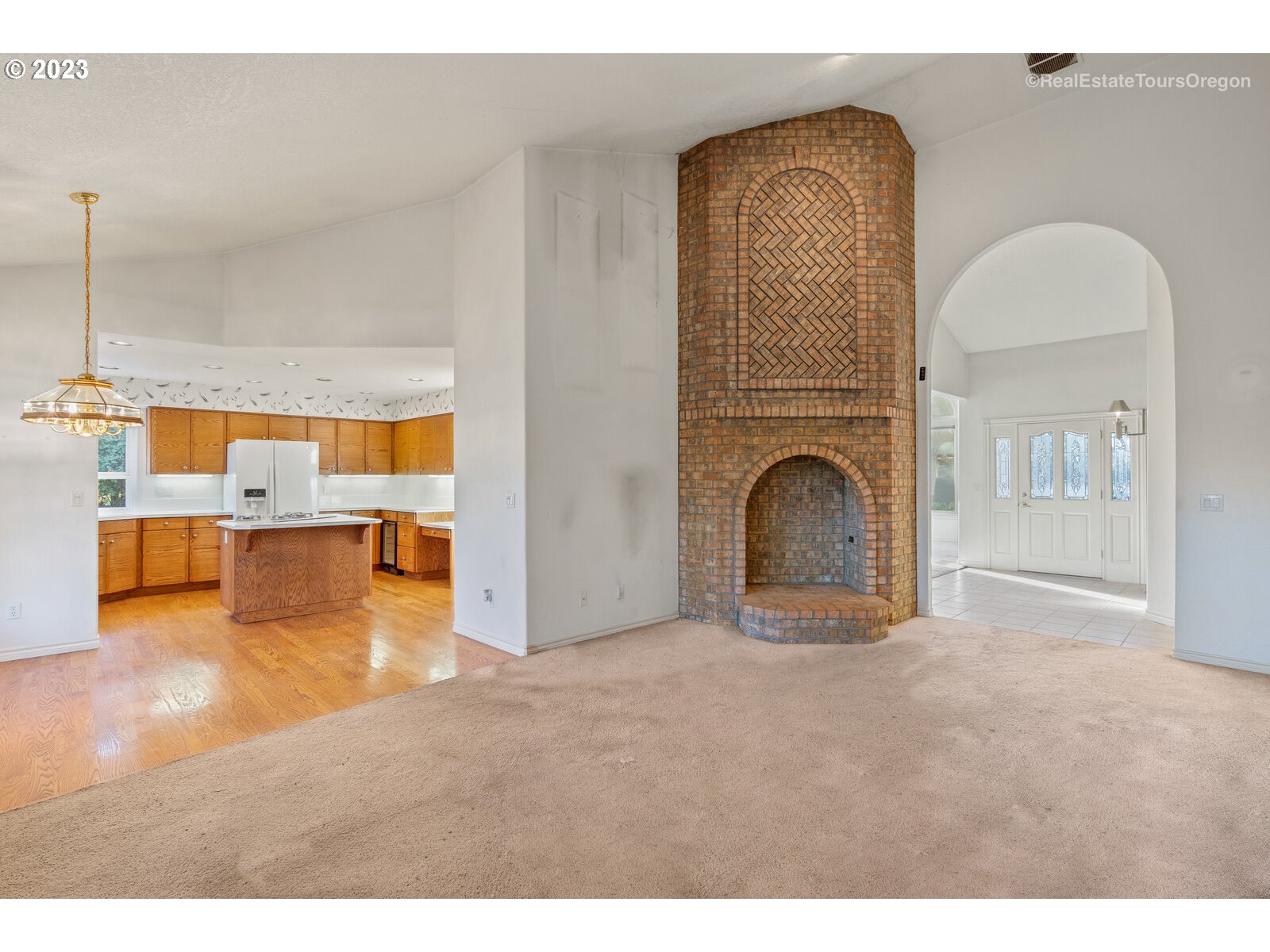 5161 Southeast Powell Valley Road Gresham, OR 97080 - Photo 7 of 32 a view of a living room a fireplace with wooden floor