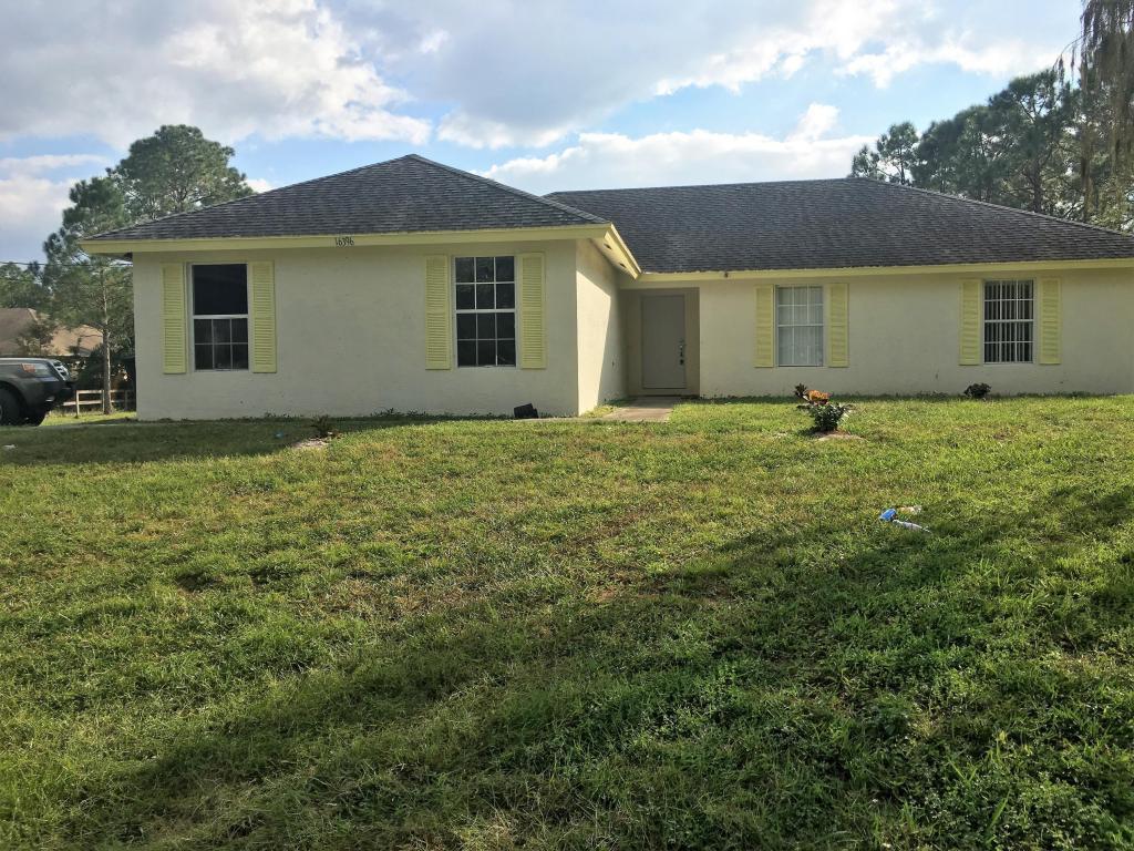 16396 Key Lime Boulevard Loxahatchee, FL 33470 - Photo 1 of 1 Front Exterior