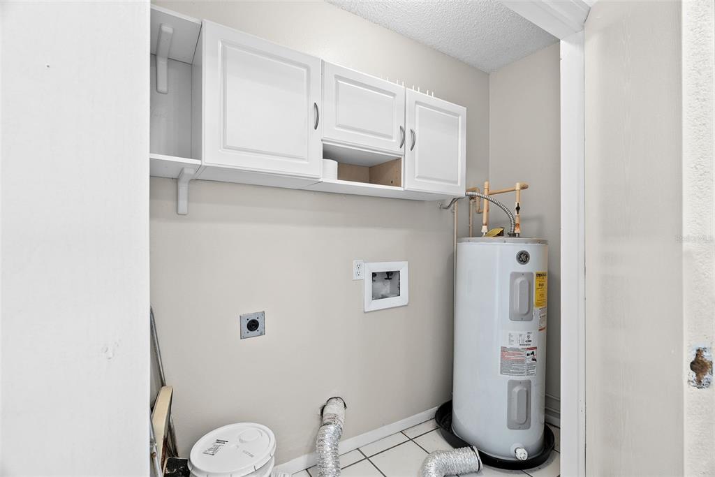 12668 Castle Hill Drive Tampa, FL 33624 - Photo 14 of 32 a bathroom with a sink and toilet