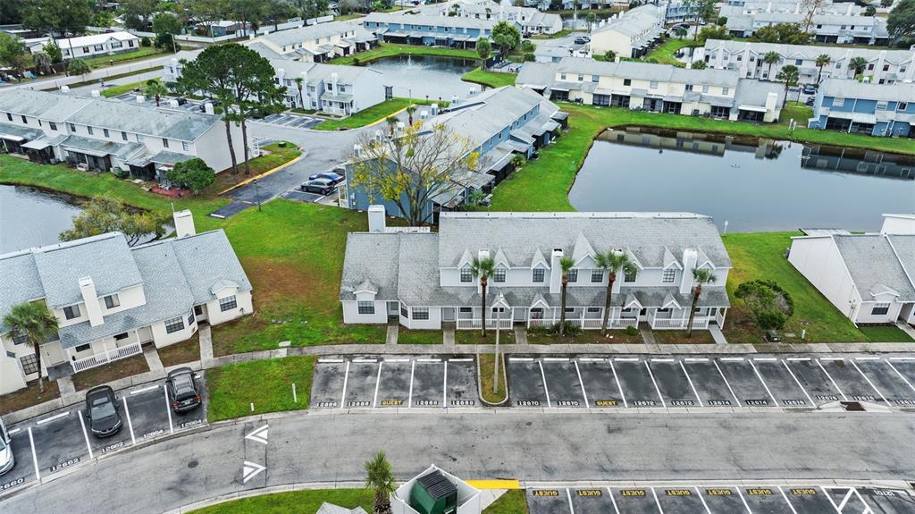 12668 Castle Hill Drive Tampa, FL 33624 - Photo 2 of 32 an aerial view of multiple houses with yard