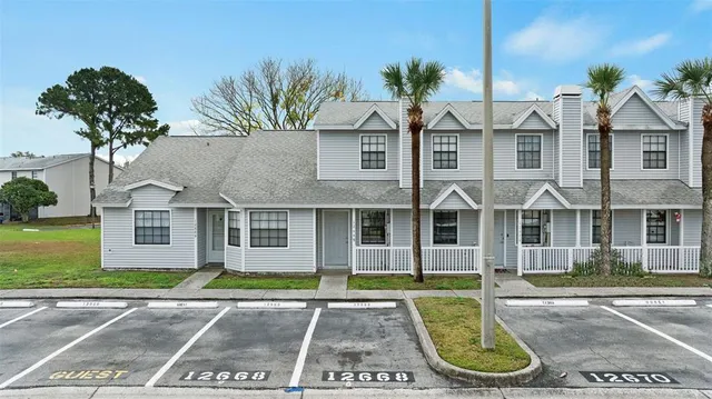 a view of city from terrace with seating space
