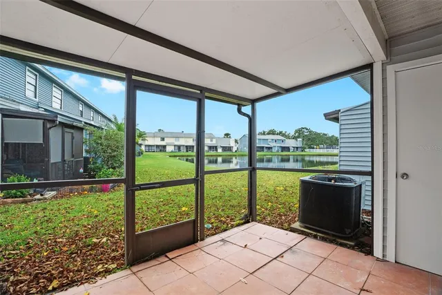 a view of balcony with yard