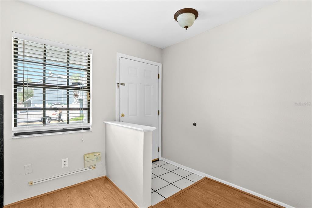 12668 Castle Hill Drive Tampa, FL 33624 - Photo 5 of 32 an empty room with windows