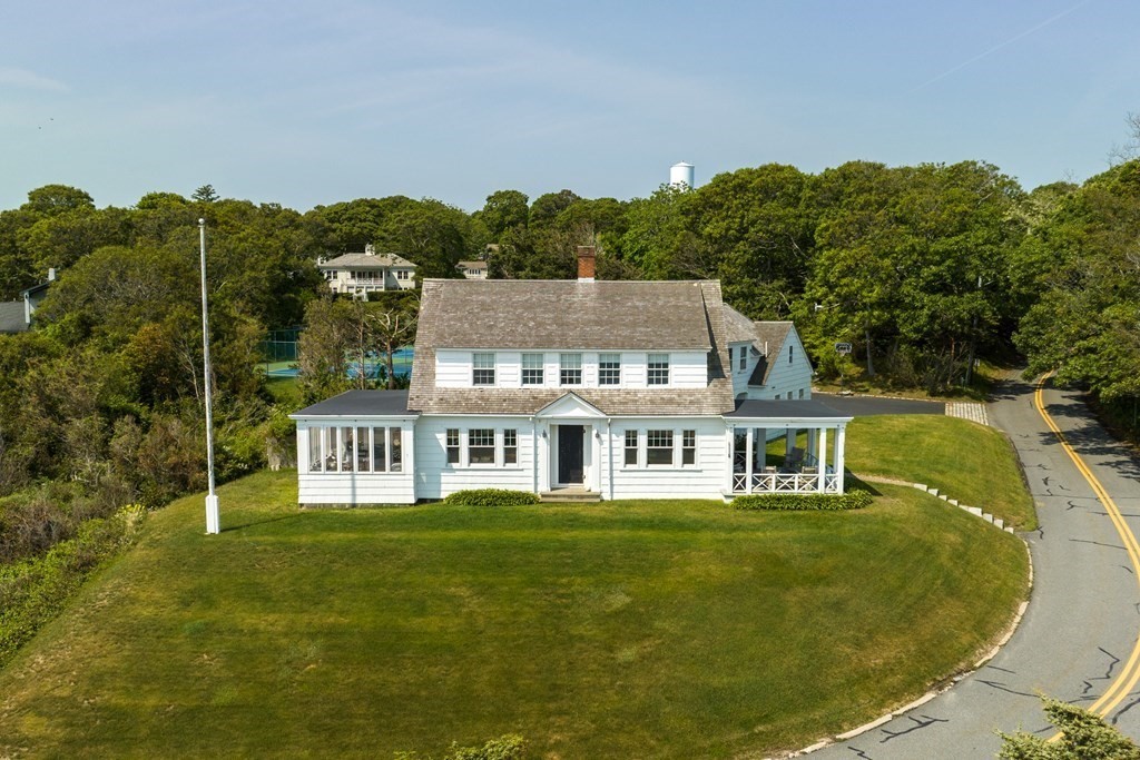 160 Clark Road Bourne, MA 02562 - Photo 1 of 42 a view of a house with a garden