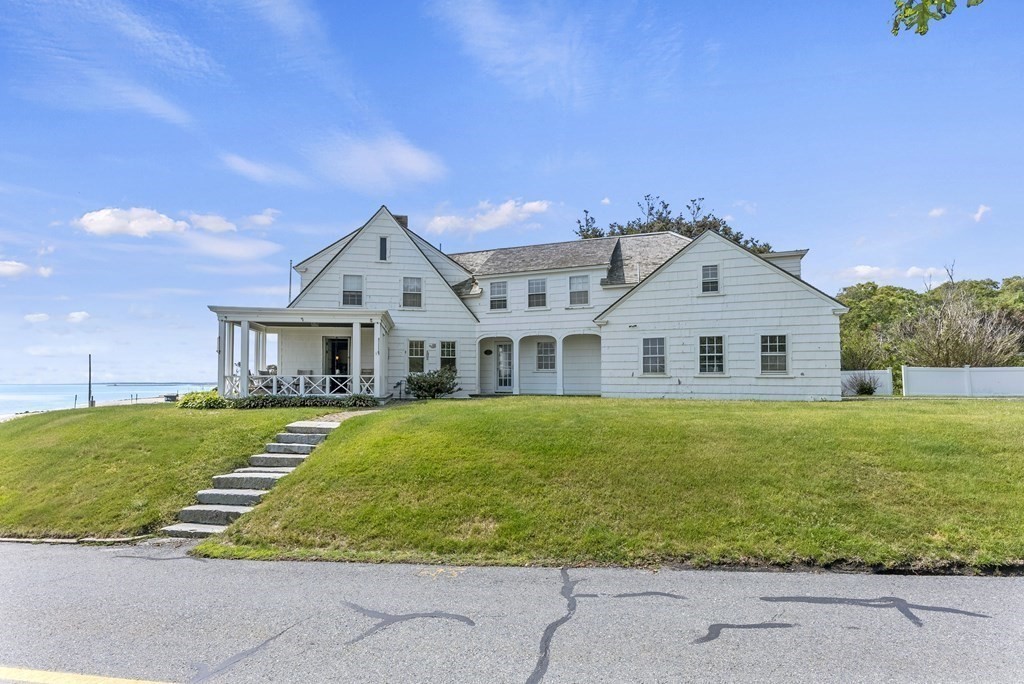 160 Clark Road Bourne, MA 02562 - Photo 12 of 42 a front view of a house with garden