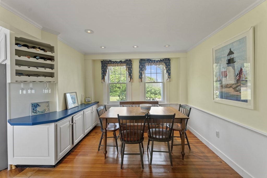 160 Clark Road Bourne, MA 02562 - Photo 29 of 42 a view of a dining room with furniture window and wooden floor