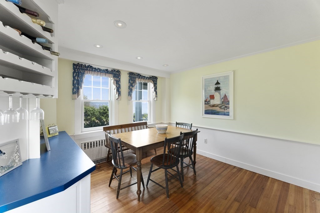 160 Clark Road Bourne, MA 02562 - Photo 30 of 42 a view of a dining room with furniture and wooden floor
