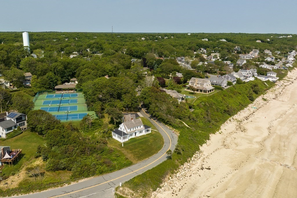 160 Clark Road Bourne, MA 02562 - Photo 8 of 42 an aerial view of residential houses with outdoor space