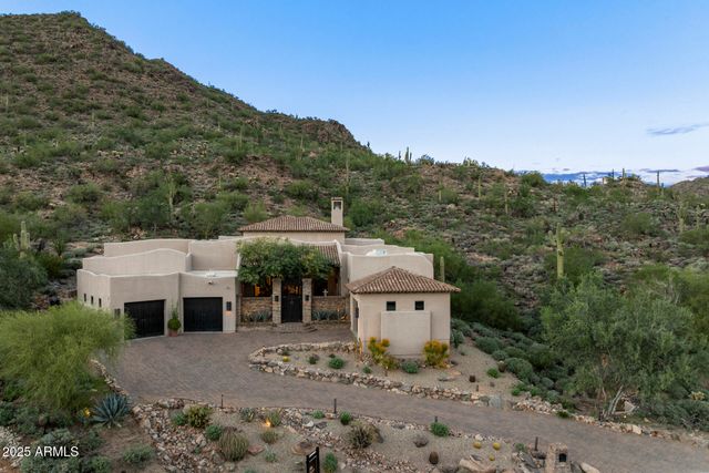 a view of a town with large trees