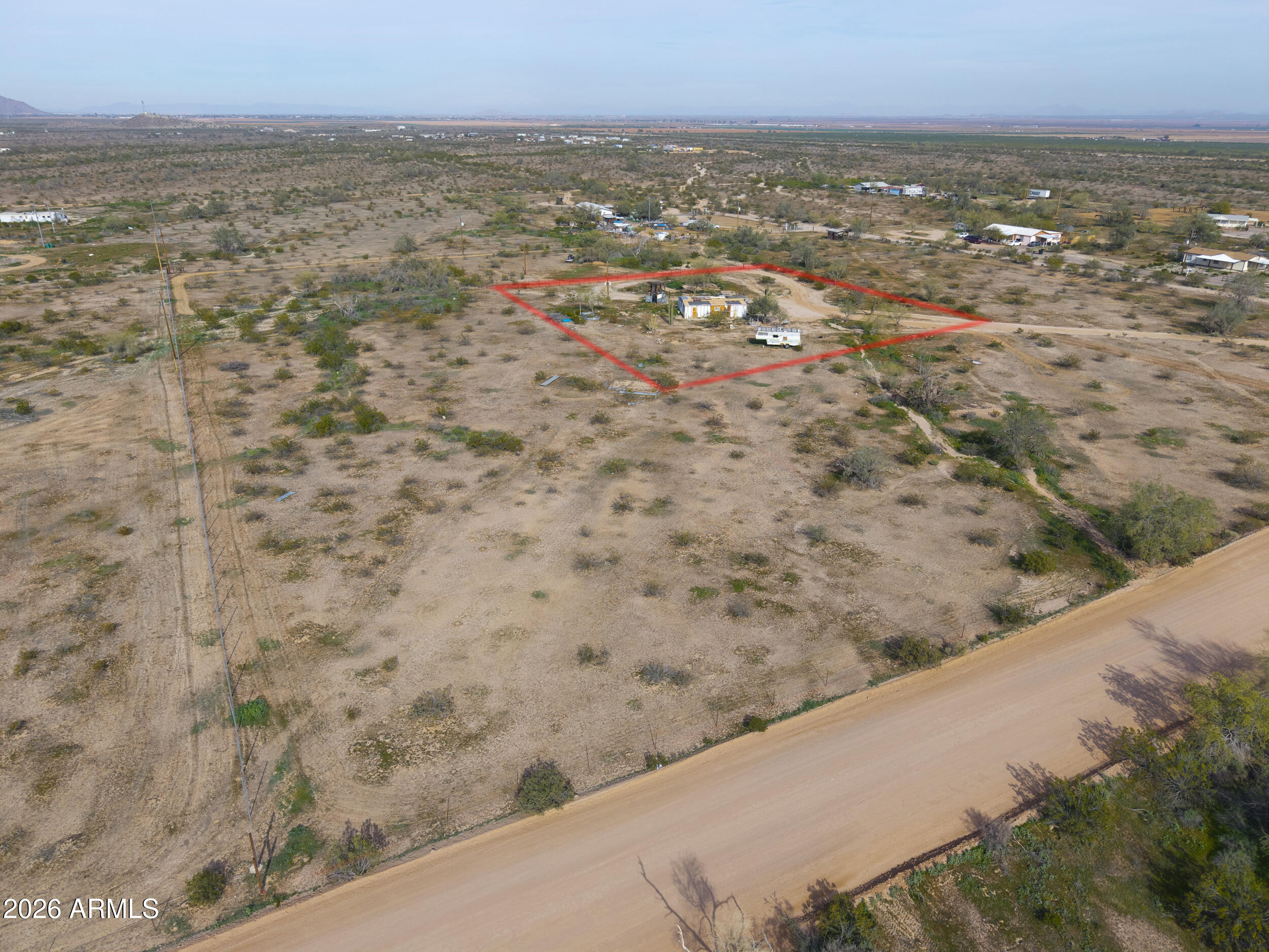3290 North Ralston Road, Unit C Maricopa, AZ 85139 - Photo 2 of 12 a view of city and ocean