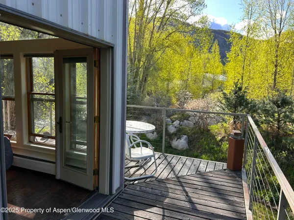 a view of a balcony with an outdoor space