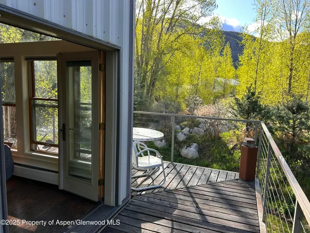 a view of a balcony with an outdoor space