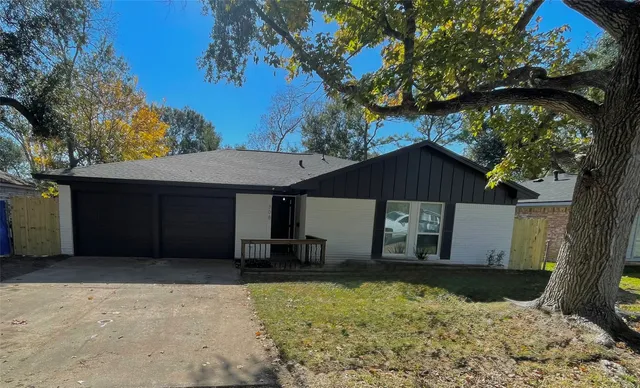 a front view of house with a yard