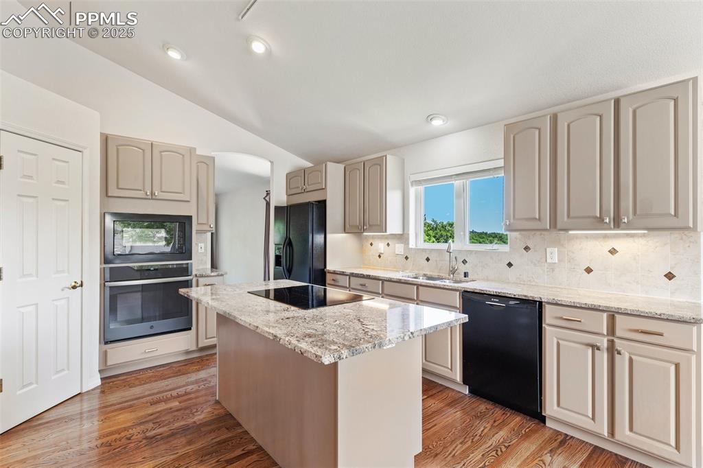 1680 Doe Run Point Colorado Springs, CO 80919 - Photo 17 of 42 Large pantry and great views from kitchen sink window