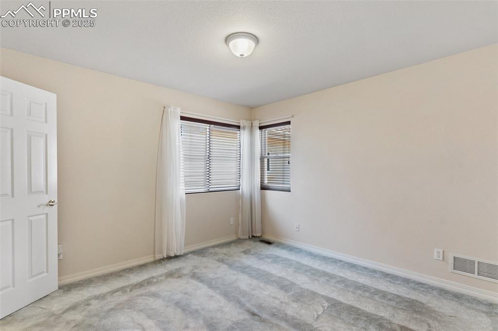 1680 Doe Run Point Colorado Springs, CO 80919 - Photo 22 of 42 Main level 2nd bedroom or office.