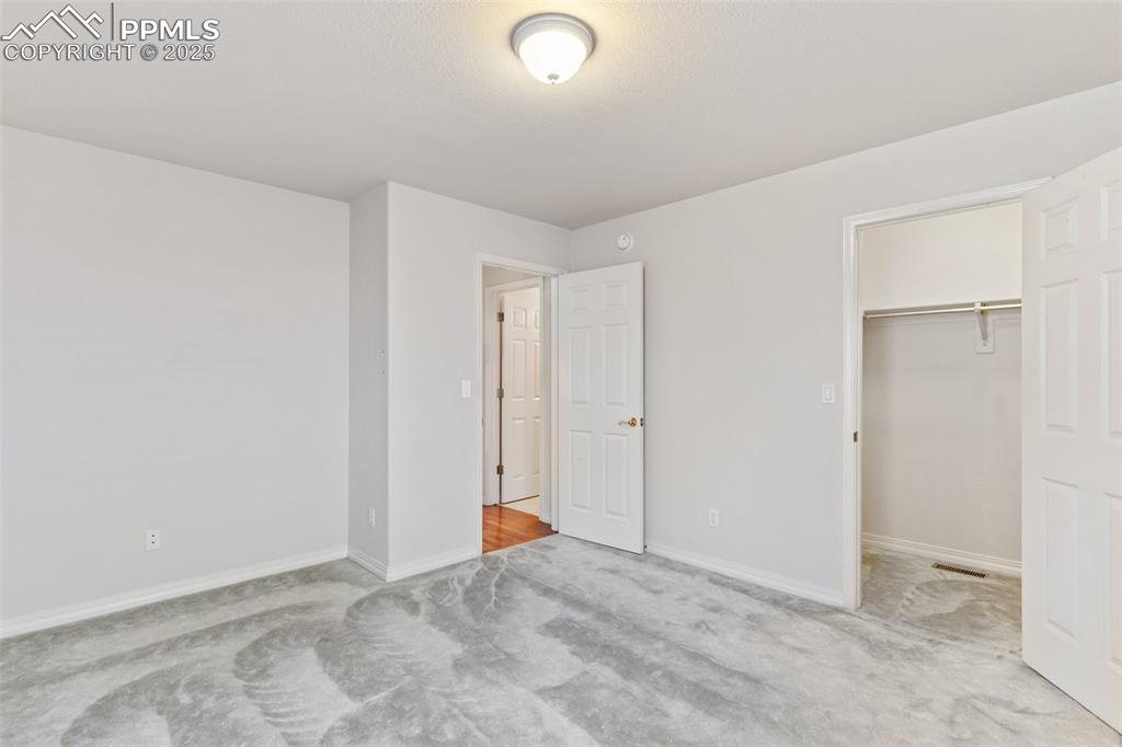 1680 Doe Run Point Colorado Springs, CO 80919 - Photo 34 of 42 Main level 2nd bedroom or office