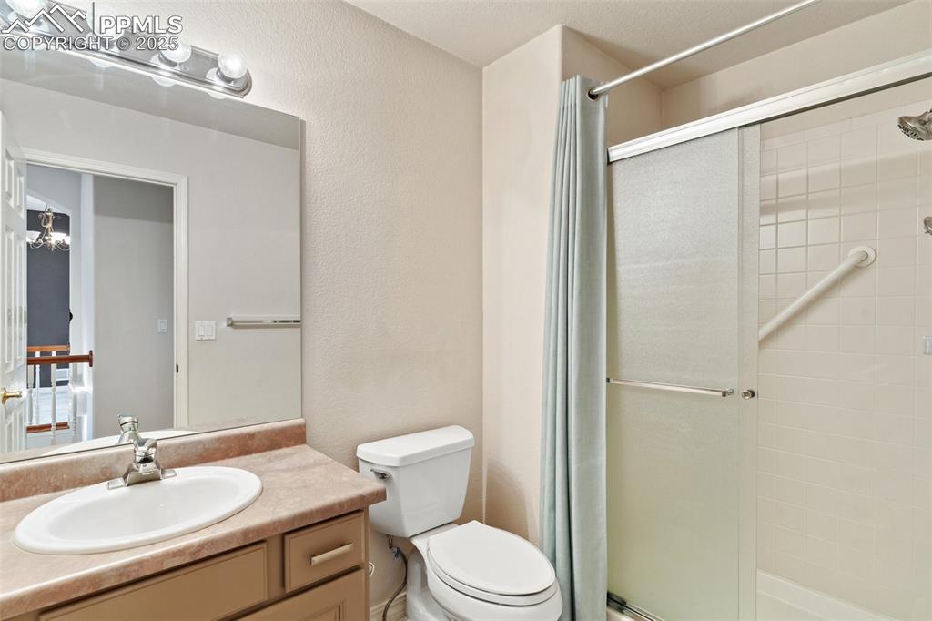 1680 Doe Run Point Colorado Springs, CO 80919 - Photo 38 of 42 Main level 3/4 bath