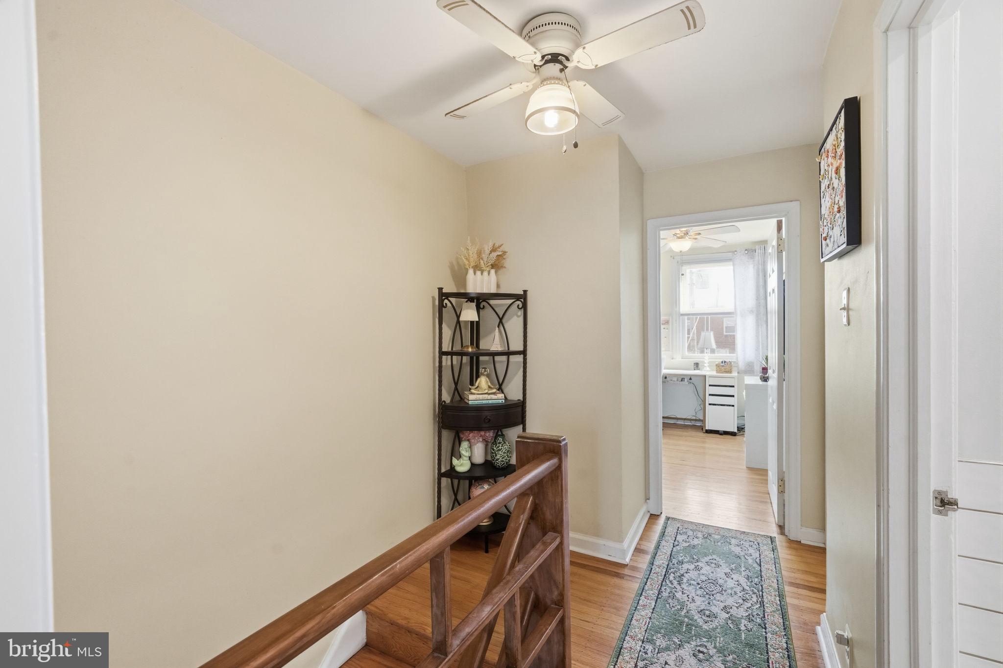 3252 Fordham Road Philadelphia, PA 19114 - Photo 16 of 29 an empty room with wooden floor fan and windows