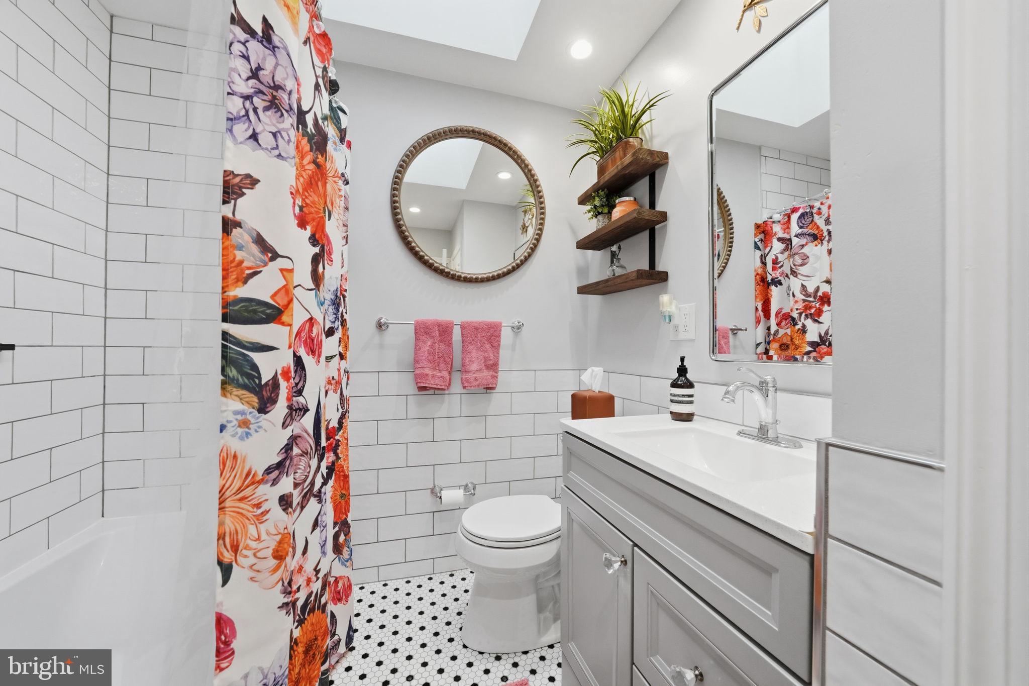 3252 Fordham Road Philadelphia, PA 19114 - Photo 21 of 29 a bathroom with a sink a mirror and a toilet