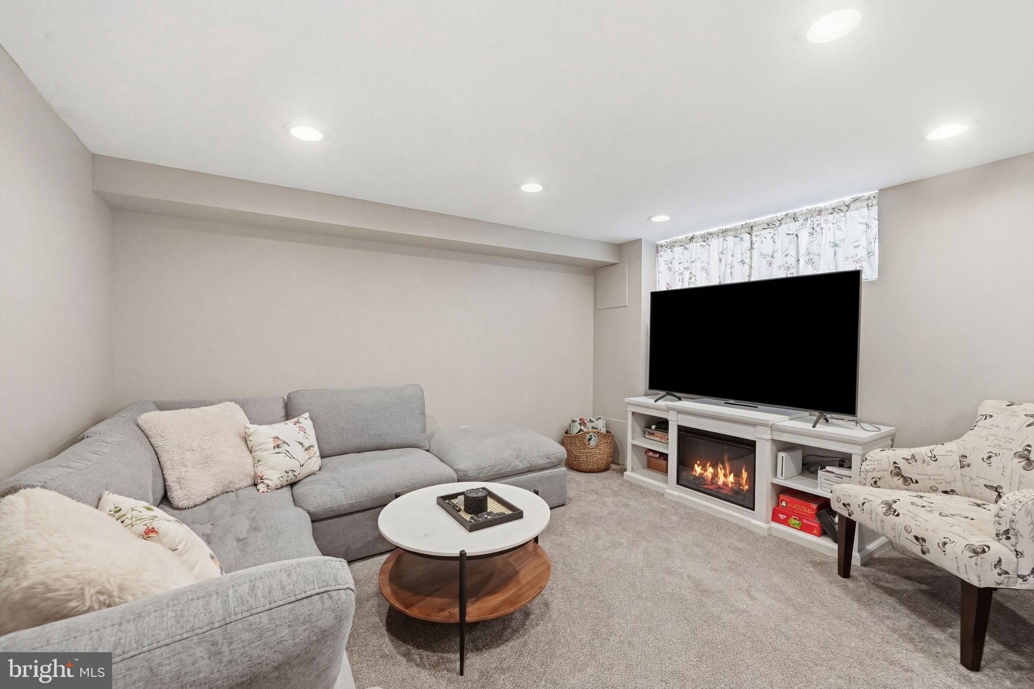 3252 Fordham Road Philadelphia, PA 19114 - Photo 23 of 29 a living room with furniture and a flat screen tv