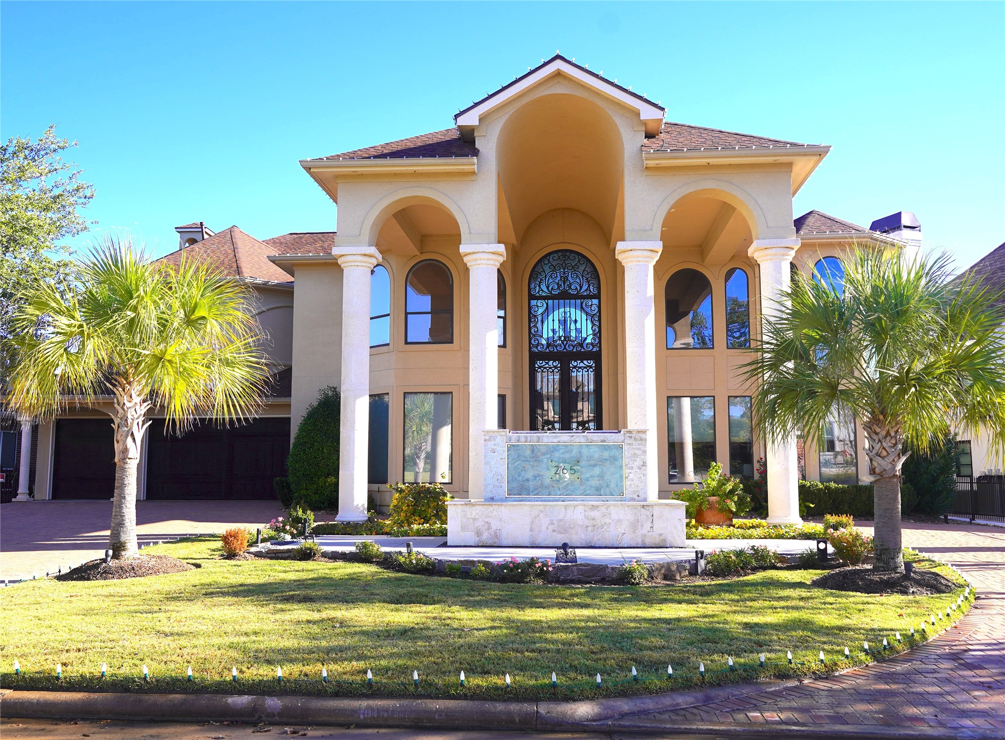 265 Promenade Street South Montgomery, TX 77356 - Photo 1 of 45 a front view of house with yard and swimming pool