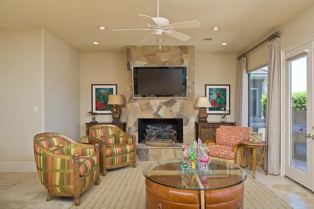 a large kitchen with stainless steel appliances granite countertop a stove and cabinets