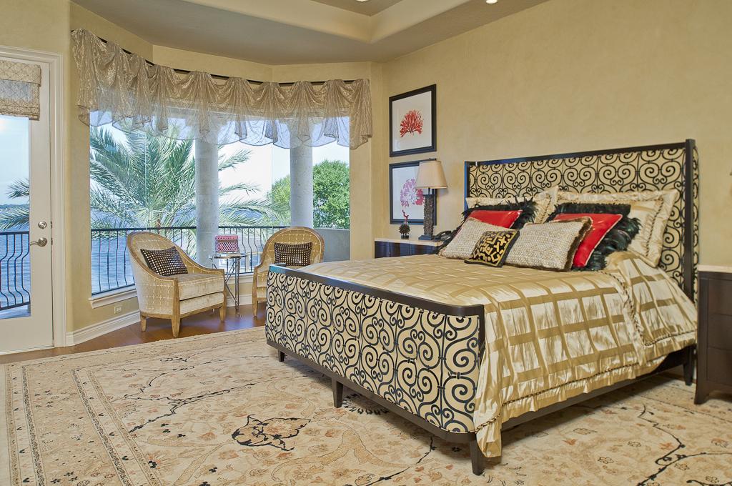 265 Promenade Street South Montgomery, TX 77356 - Photo 27 of 45 a bed sitting in a bedroom next to a window